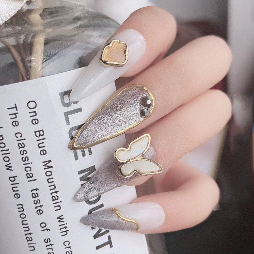 [Hàng mới về] Túi 2 phụ kiện đính trang trí móng tay nghệ thuật kim loại hổ phách 3D thời trang