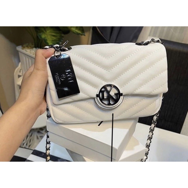 Túi lyn đeo chéo khoá tròn