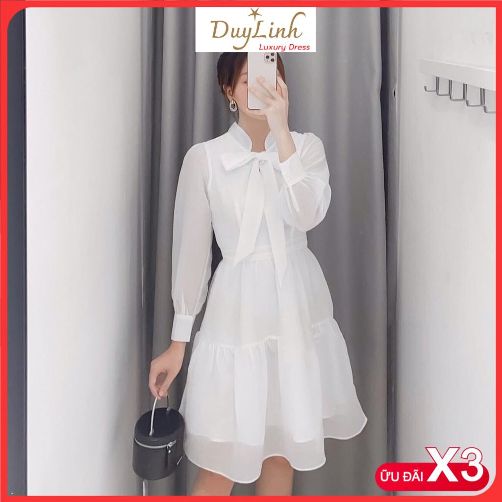 Đầm công sở trắng xanh nơ ngực tơ tầng xinh xắn