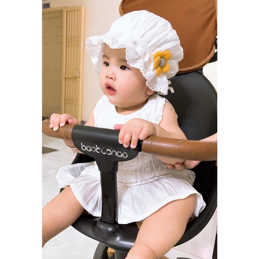Mũ trắng hoa cúc  vải xô muslin cho bé