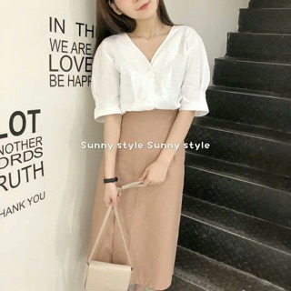 Chân váy midi xẻ bên