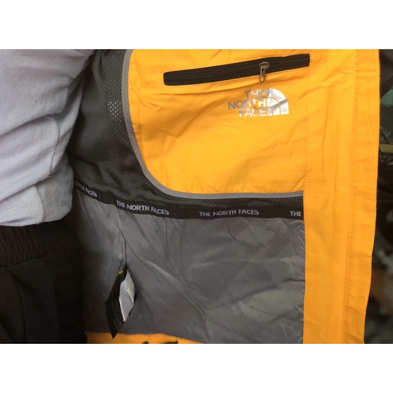 Áo gió cao cấp TNF The North Face 2 lớp hàng Việt Nam xuất khẩu xịn nam nữ chống thấm nước màu vàng nghệ