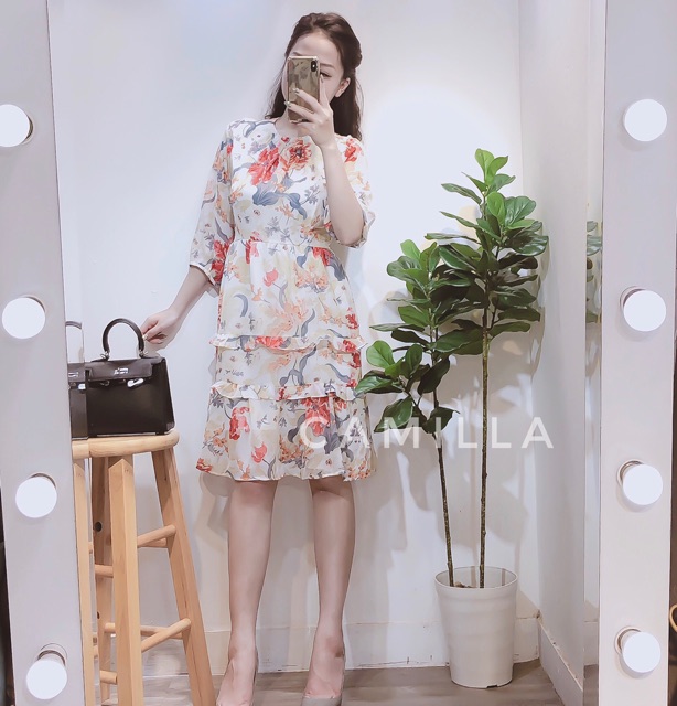 Váy xoè hoa nhí xếp ly cổ