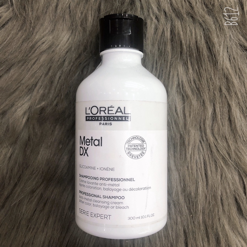 Dầu gội làm sạch giúp tóc chắc khỏe và bóng mượt Metal DX Loreal 300ml ( Hàng chính hãng )