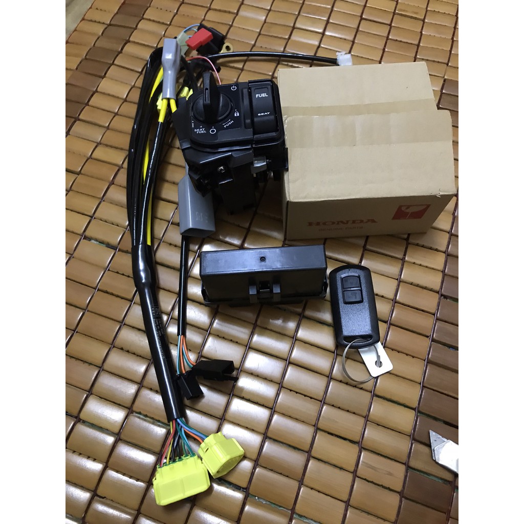 Bộ khóa smartkey 2 nút cho AB, lead, vision, vario không phải MÀi NHỰA ... có CHỐNG DẮT