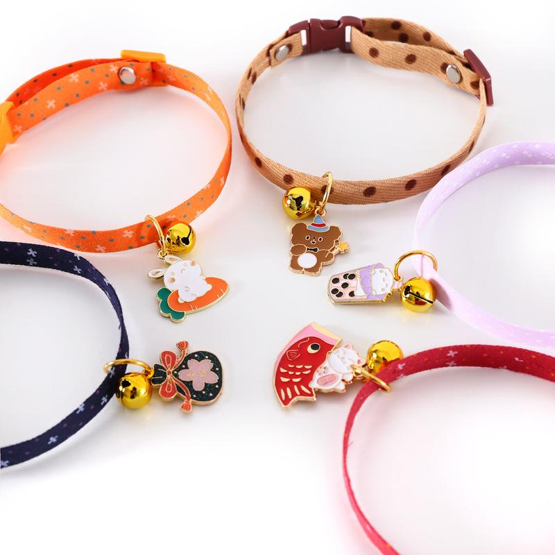 Vòng cổ họa tiết chấm bi / trà sữa nhiều kiểu mừng năm mới gắn chuông vui nhộn có thể điều chỉnh cho thú cưng