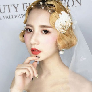 Cài tóc đính hạt ngọc trai cho cô dâu