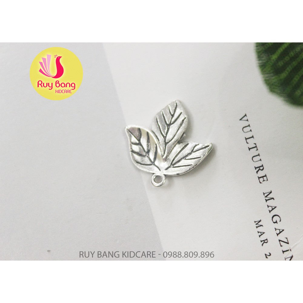 Cành lá kim loại, center đá đính hoa vải handmade