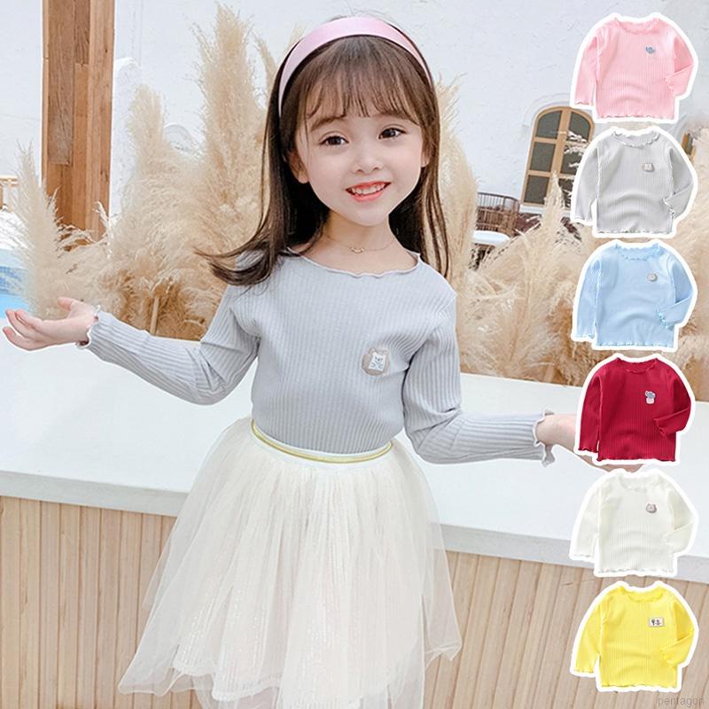 Áo thun tay dài viền bèo màu trơn dành cho bé gái