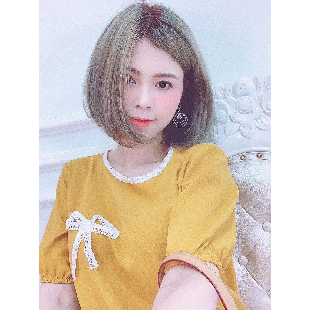 VÁy cổ tròn nơ đuôi cá