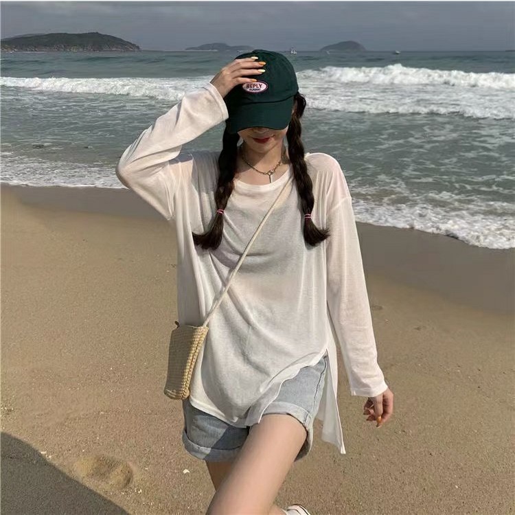 Áo thun dài tay xẻ tà chât xược.