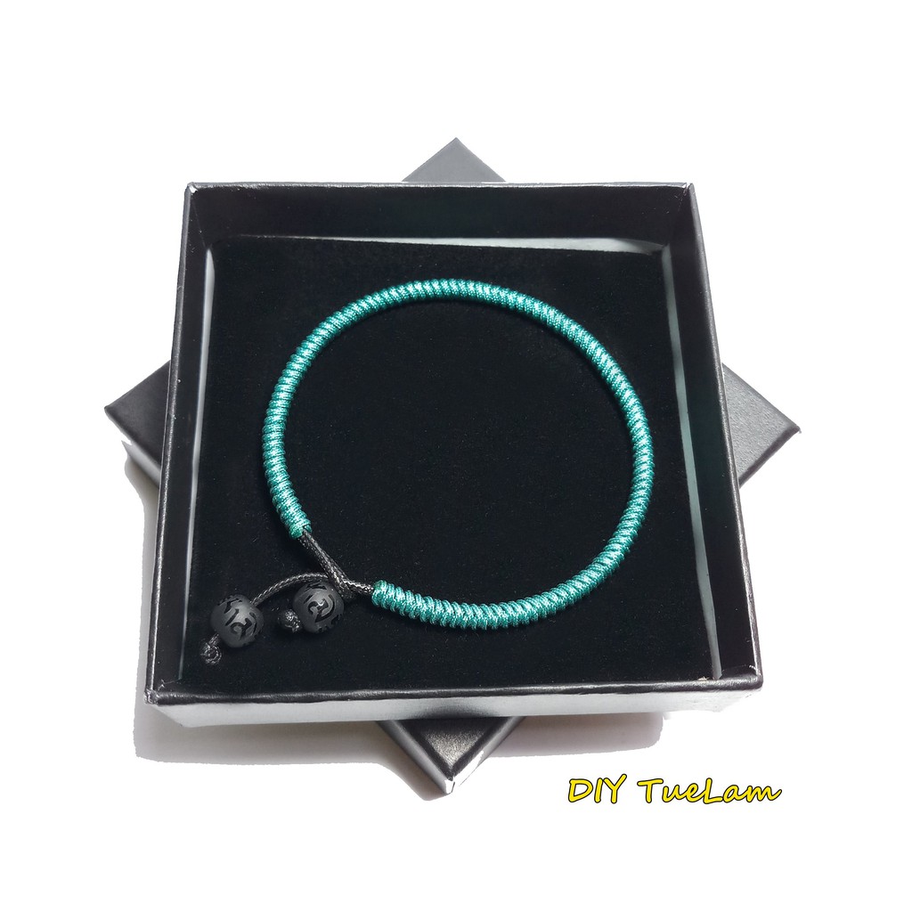 Vòng tay nữ may mắn dây chỉ màu xanh dương nút khóa hạt charm núi lửa khắc chú bình an - Tuệ Lâm