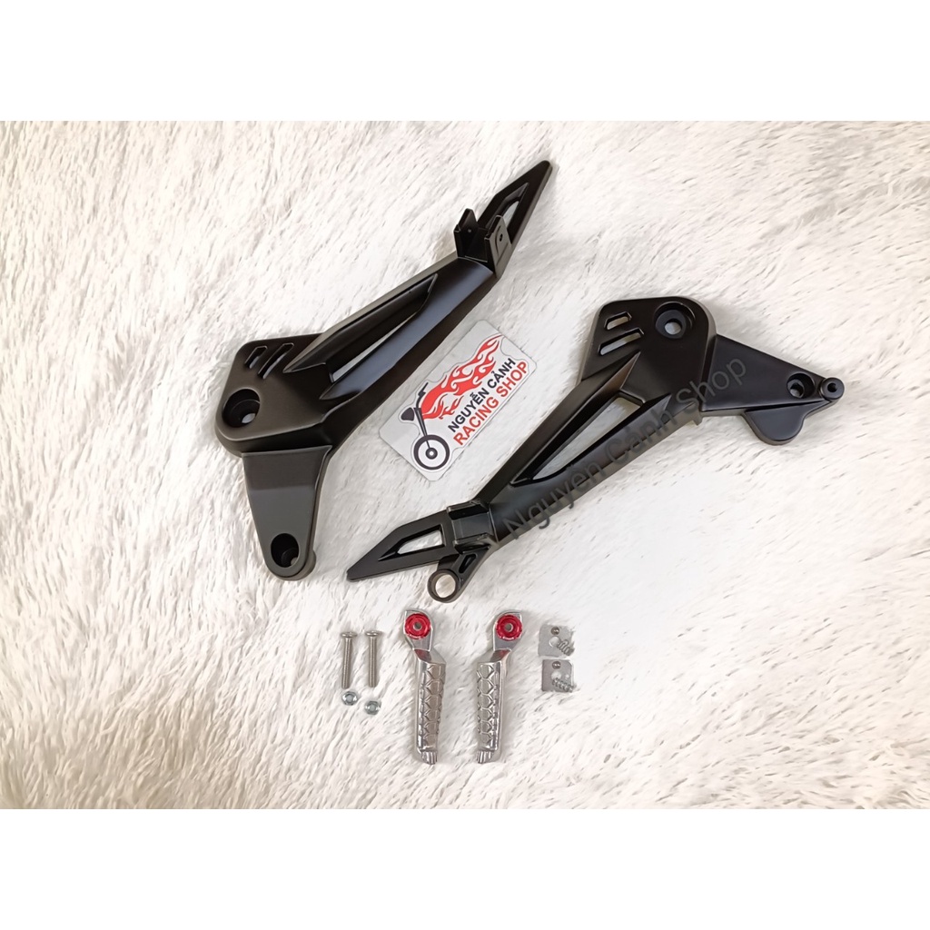 Gác chân Wave dream đùi gà đen có ốc xếp bật bi