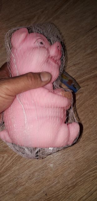 Chú Heo bóp kêu bằng nhựa cầm vàng