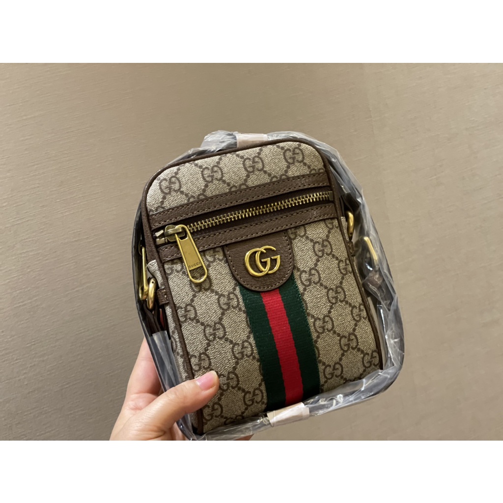 Túi đeo chéo mini thời trang GUCCI GG GC với họa tiết thương hiệu cổ điển