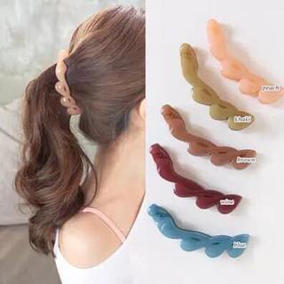 kẹp toc dọc thần thánh