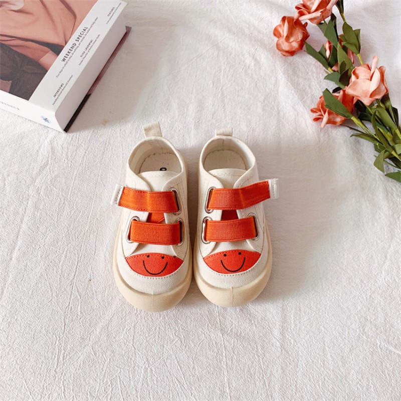 Giày Thể Thao Vải Canvas Khóa Dán Họa Tiết Mặt Cười Hoạt Hình Dễ Thương Cho Bé