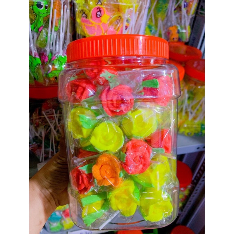 lọ 40 chiếc kẹo mút hoa hồng ( sỉ đồ trẻ em)