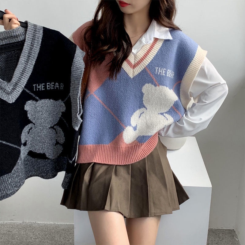 Set áo sơ mi dài tay và áo len không tay thời trang có bán lẻ