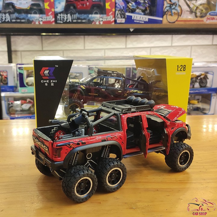 Mô hình xe ô tô Ford F150 Raptor 6x6 tỉ lệ 1:28 màu đỏ