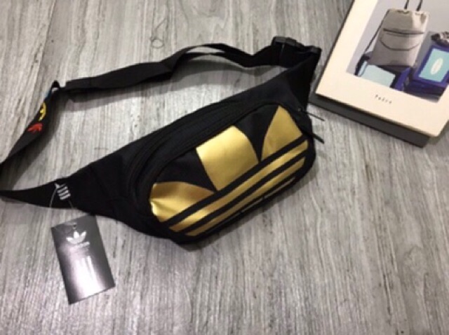 Túi bao tử logo vàng