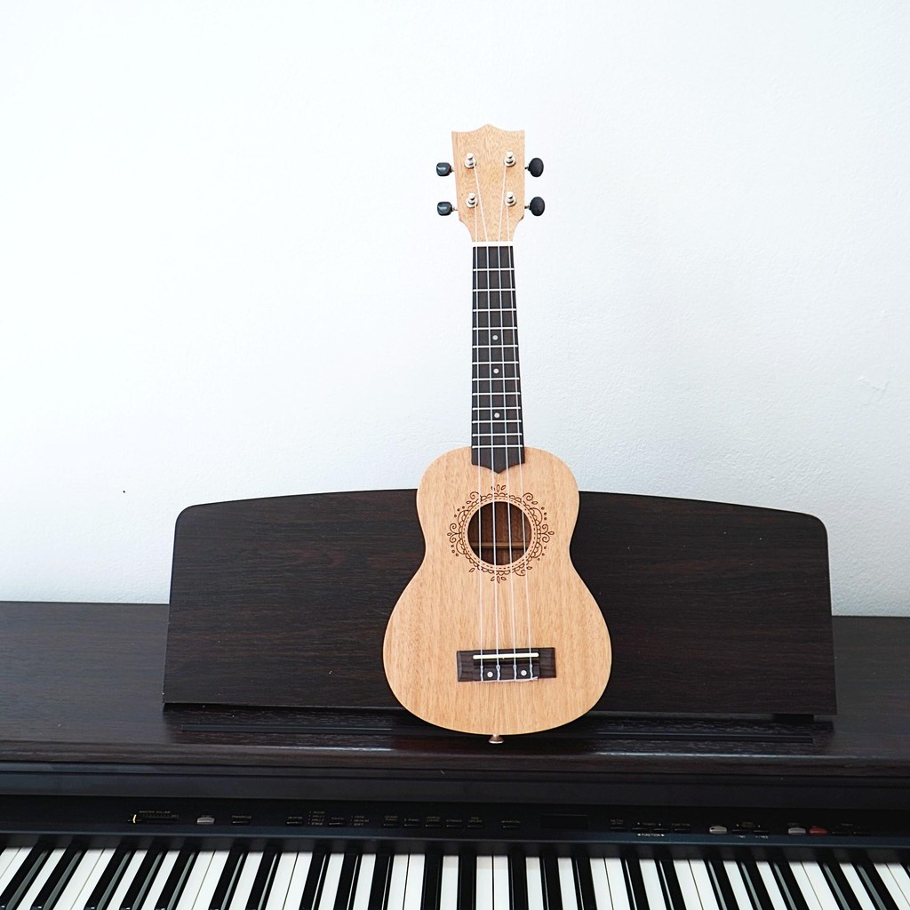 Đàn ukulele soprano gỗ mộc size 21 inch giá rẻ Tặng Giáo Trình phụ kiện Enzi