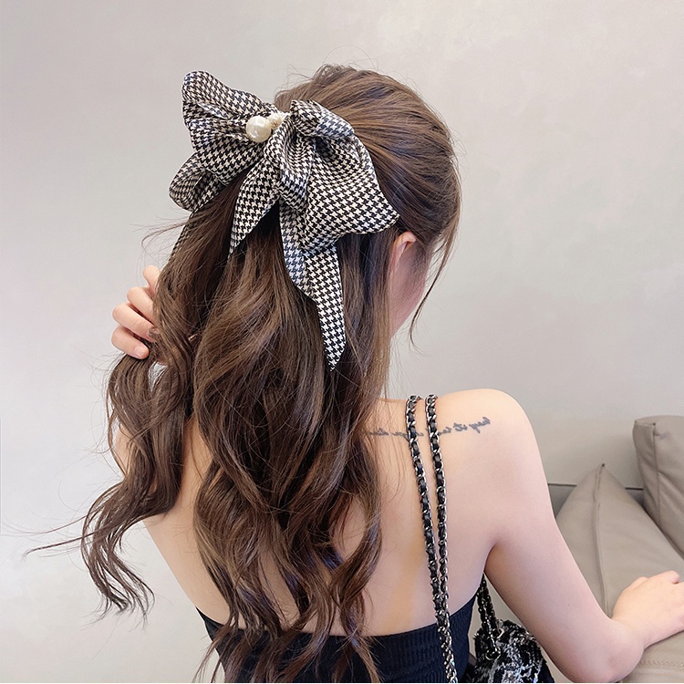 Kẹp tóc hình hơ đính ngọc trai giả xinh xắn cho nữ