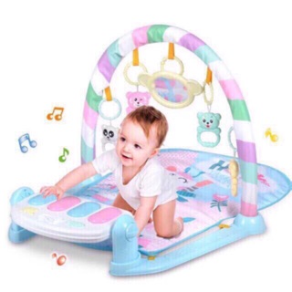 Thảm nằm kệ chữ A kèm đàn Piano
