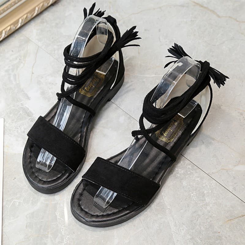 Giày sandal quai ngang cột dây tua rua