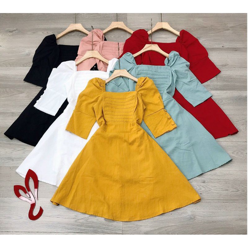 Đầm nút bọc tay phồng xép ly ngực mocking