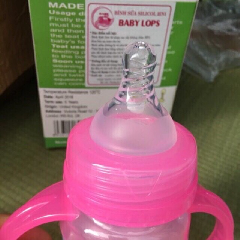Bình sữa Silicon cầm tay Baby love có tặng kèm núm thìa ,van chống sặc