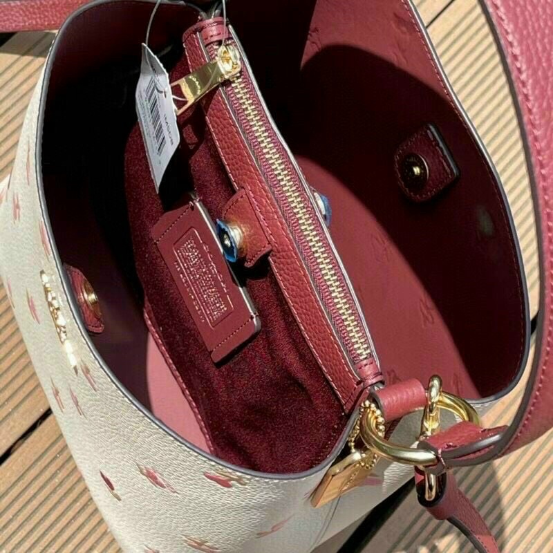 Túi Coach bucket hoa xinh size nhỏ