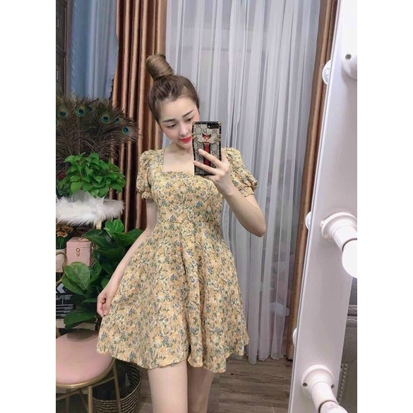Jump hoa cổ vuông tay phồng có mút.