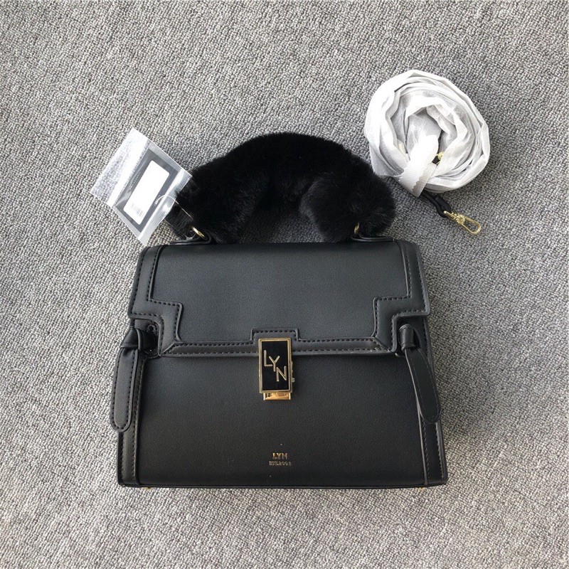 Túi lyn tay cầm lông