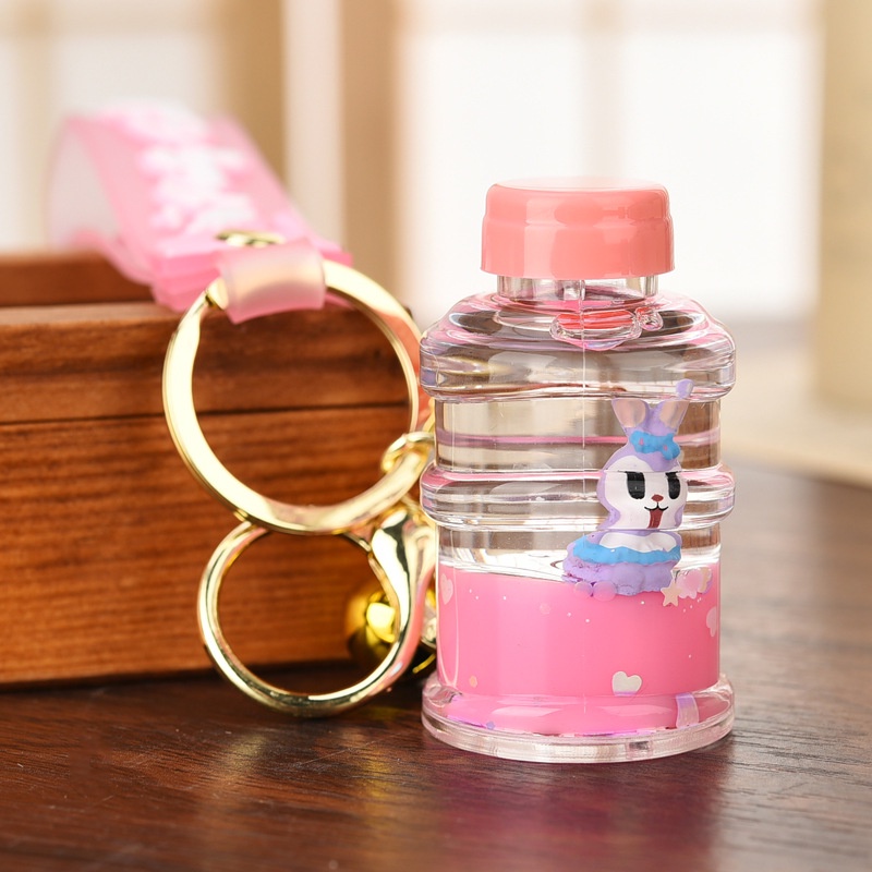 Móc khóa cute độc đáo hình chai nước thú cưng đẹp phong cách độc lạ bền đẹp.