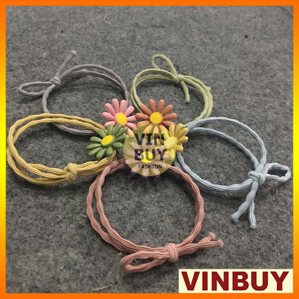 Cột tóc hình hoa cúc nhiều màu