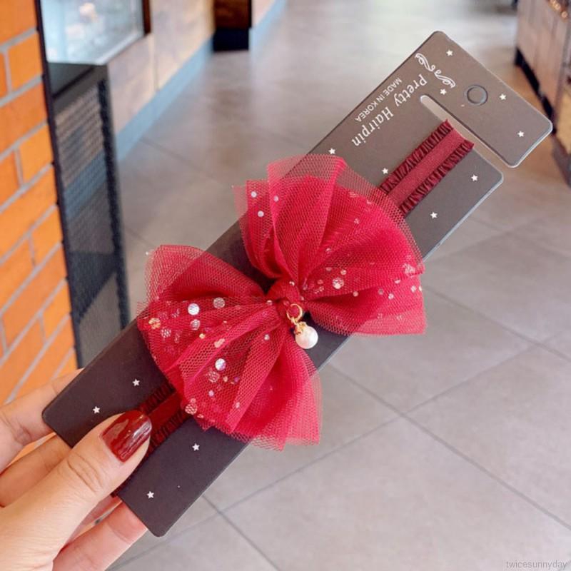 Băng đô cài tóc chúc mừng năm mới cho bé gái