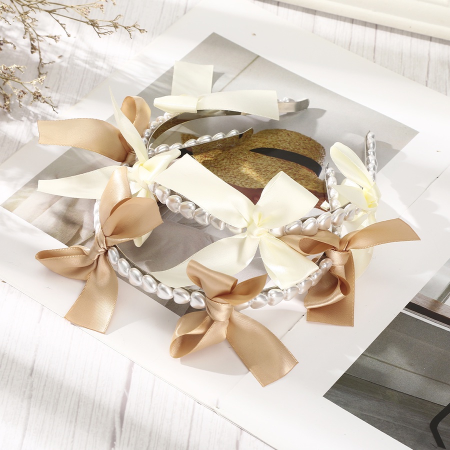 Băng Đô Cài Tóc Đính Nơ Ngọc Trai Dễ Thương Dành Cho Nữ