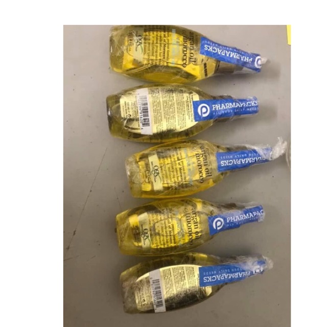 Tinh dầu dưỡng tóc ogx