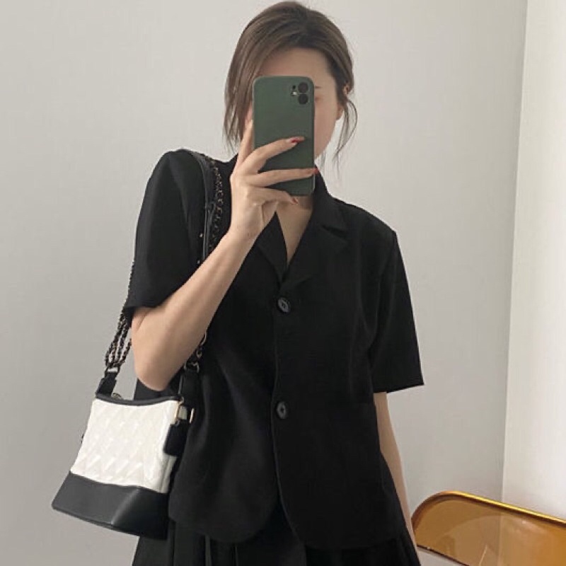 Set áo vest phối chân váy xoè xếp ly LeLa LDT12 màu đen nâu tây