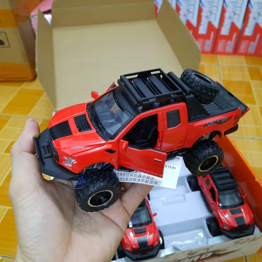 Xe mô hình ô tô FORD offroad F150 tỉ lệ 1:32 bằng hợp kim và nhựa đồ chơi trẻ em có âm thanh và đèn mở được cửa