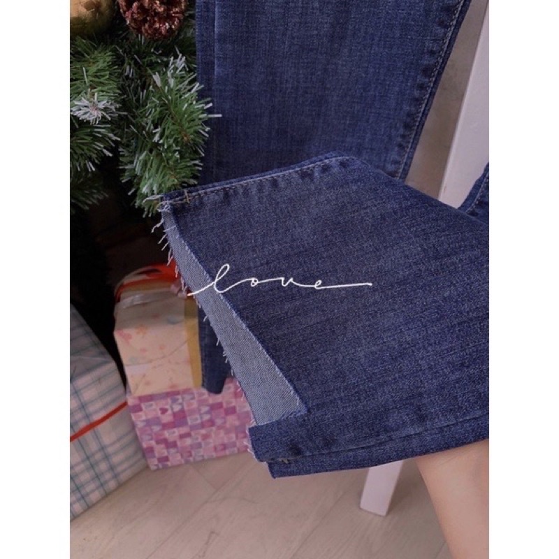 Quần jeans nữ ống đứng gấu cắt lệch