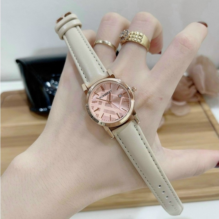 Đồng hồ nữ Burberi màu kem Xinh xắn- Dễ Thương- Viền mạ sang trọng- Tặng hộp tặng Pin đi kèm