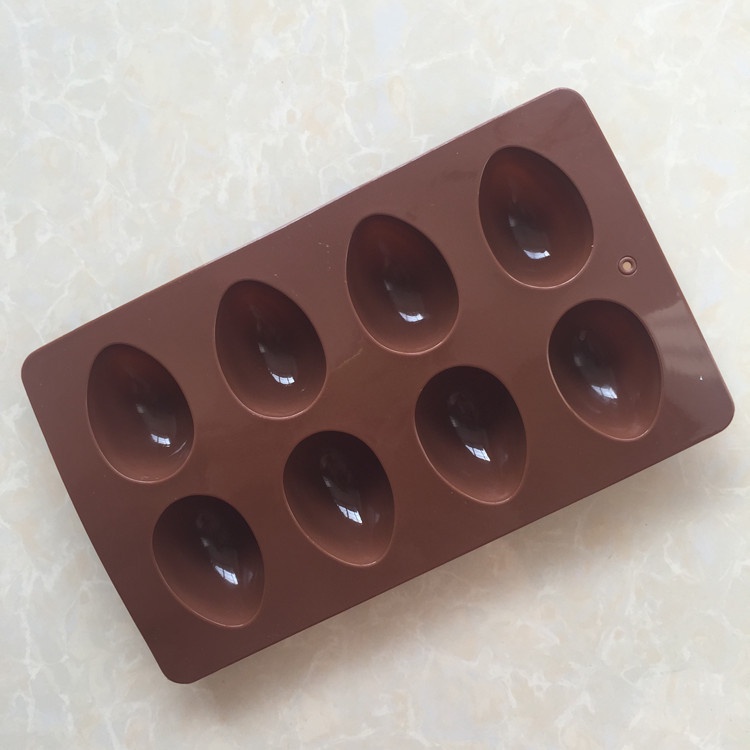Khuôn silicone Làm Bánh 8 Lỗ Hình Quả Trứng Khủng Long