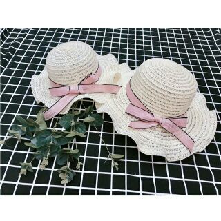 Nón cói đi biển nơ hồng
