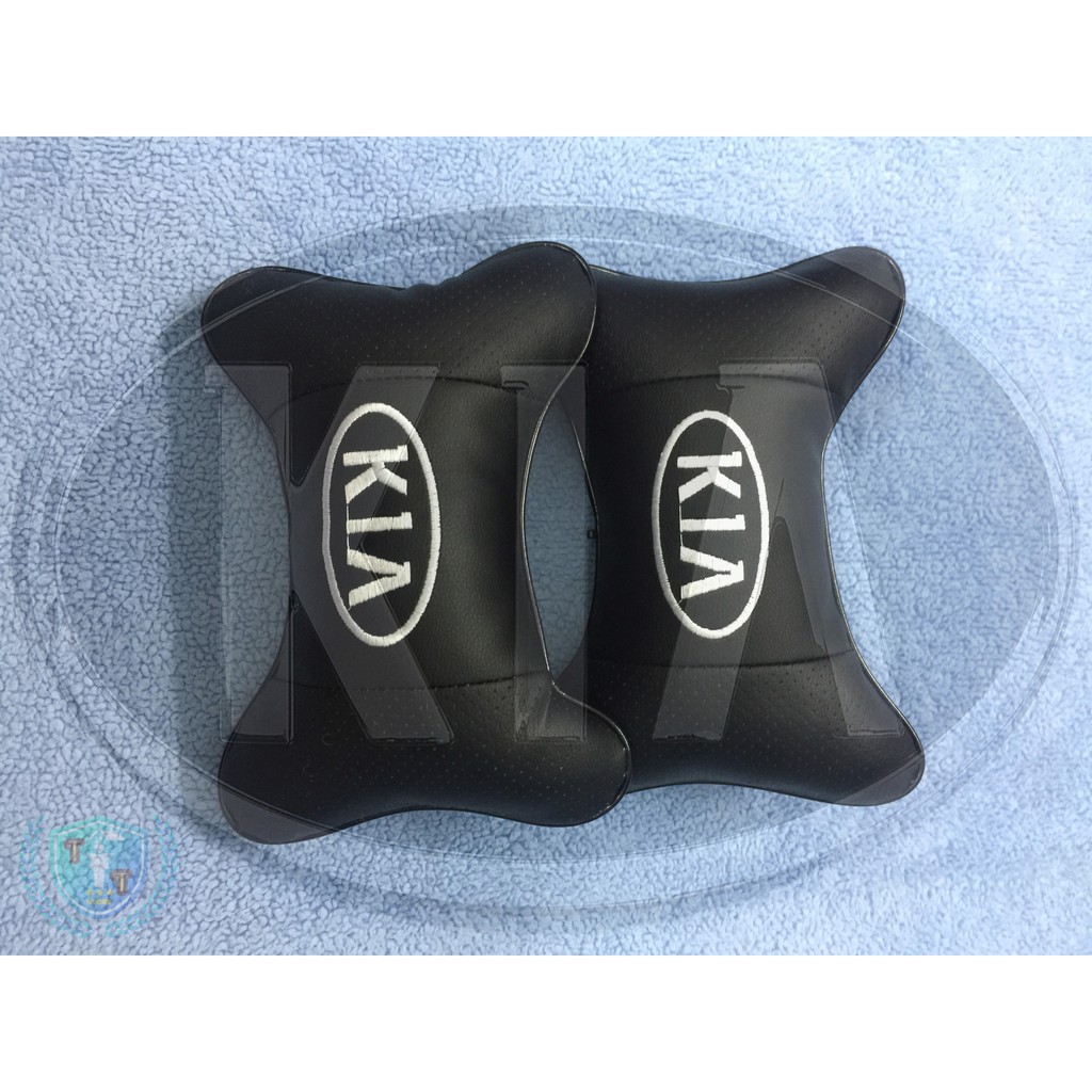 Gối tựa đầu bằng da cho ghế xe ô tô có gắn logo của các hãng xe | BigBuy360 - bigbuy360.vn