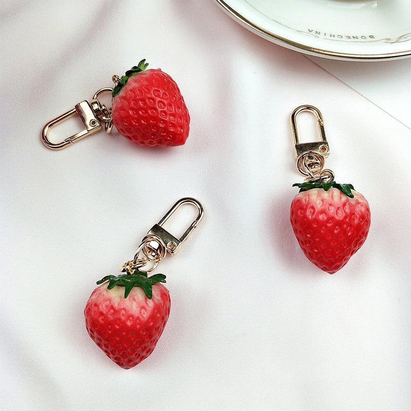 Móc Khóa Mềm Mại Hình Quả Dâu Tây Kiểm Soát Lượng Nhẹ Sáng Tạo Dễ Thương