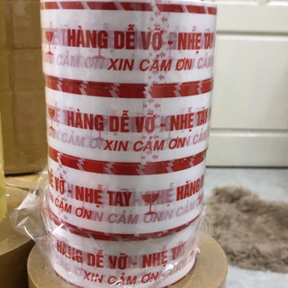 1 cây băng keo niêm phong in chữ “ hàng dễ vỡ..”