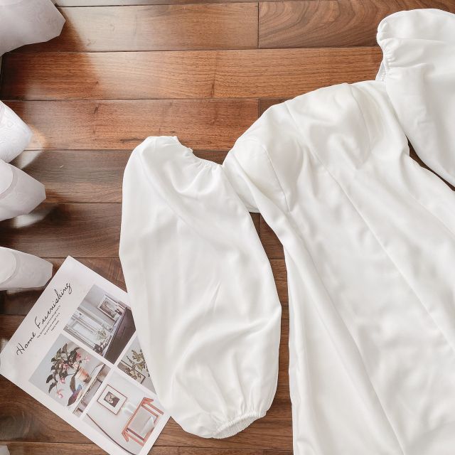 Đầm trắng tay bồng