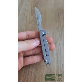 Móc khóa cán titan dùng lưỡi dao mổ
